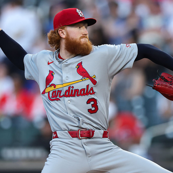 Dustin May of the Cardinals throwing a pitch against the Mets