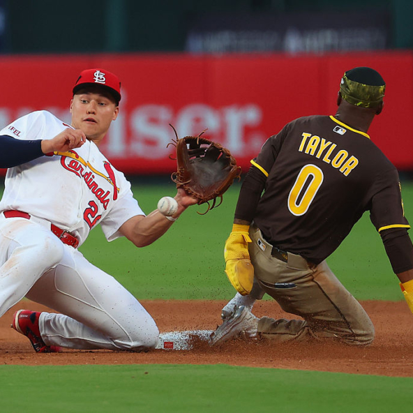Samad Taylor of the Padres stealing a base against the Cardinals