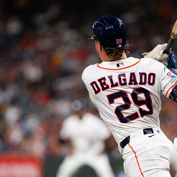 Raynel Delgado of the Astros ripping a single against the Tigers