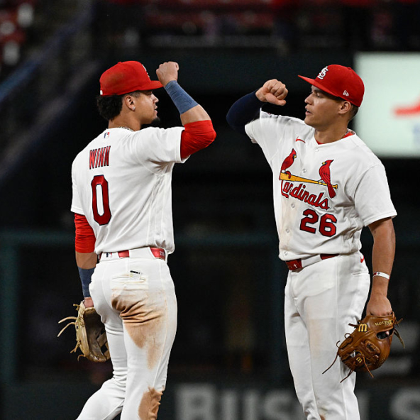 Masyn Winn and JJ Wetherholt of the Cardinals celebrating a win over the Diamondbacks