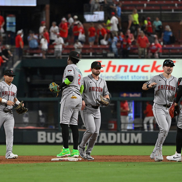 Members of the Diamondbacks celebrating a win over the Cardinals