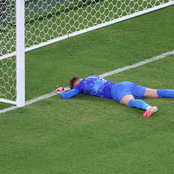 Bart Verbruggen of the Netherlands, one of the World Cup teams with a close Big Four parallel. Verbruggen is facedown, lamenting a bad penalty-kick goal he had just allowed to Morocco in a penalty shootout