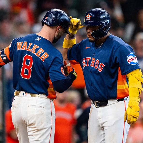 Isaac Paredes and Christian Walker of the Astros celebrating a home run against the Rays