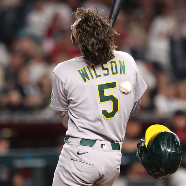 Jacob Wilson of the Athletics getting hit by a pitch against the Diamondbacks