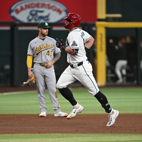 James McCann of the Diamondbacks running out a home run against the Athletics. This home run was the 100th of his career.