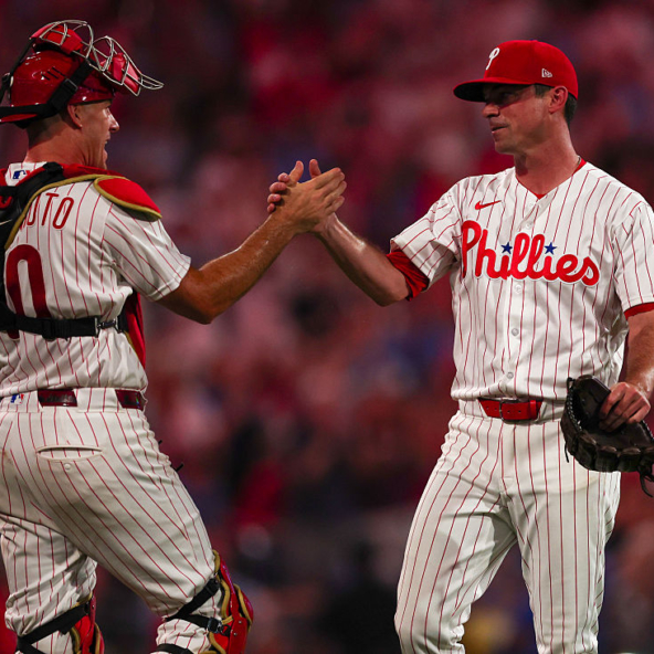 Phillies reliever Brooks Raley, top of the Week 20 NL Middle and Long Reliever Rankings, celebrating a win