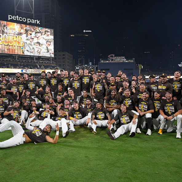 The Padres pose for a team photo after eliminating the Cubs in the 2026 NL Wild Card Series and advancing to the Division Series, where they will face the Brewers