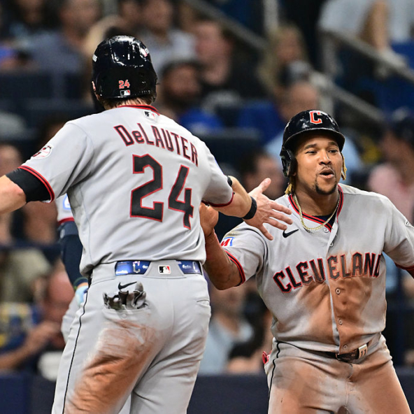 Jose Ramirez and Chase DeLauter of the Guardians celebrating against the Rays in Game One of the 2026 ALCS