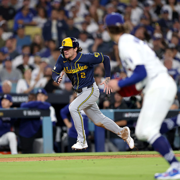 Brice Turang of the Brewers scoring on a wild pitch against the Dodgers in Game Three of the 2026 NLCS