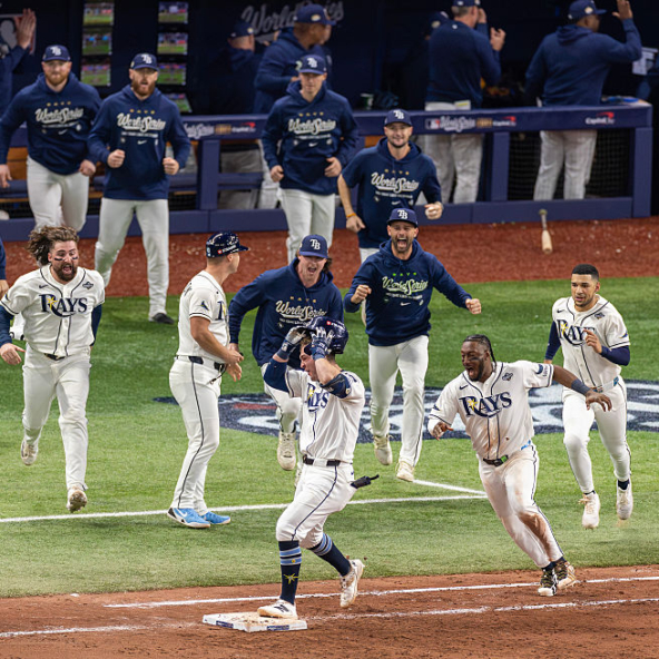 The Rays celebrating after Ben Williamson hit a walk-off single to win Game 4 of the 2026 World Series against the Brewers
