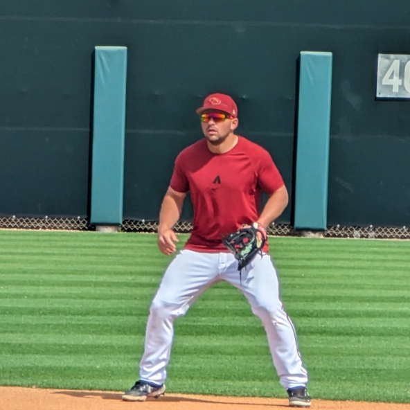 Buddy Kennedy waiting to field a ground ball in spring training defensive drills