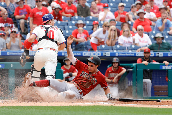 Josh Rojas scores for the Diamondbacks against the Phillies. The Diamondbacks play the Phillies after taking two of three from the Pirates.