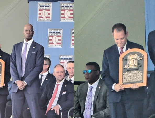 Fred McGriff and Scott Rolen on stage with their plaques at the Hall of Fame induction ceremony