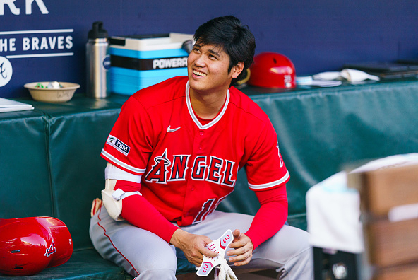 2023 AL MVP Shohei Ohtani sitting in the dugout