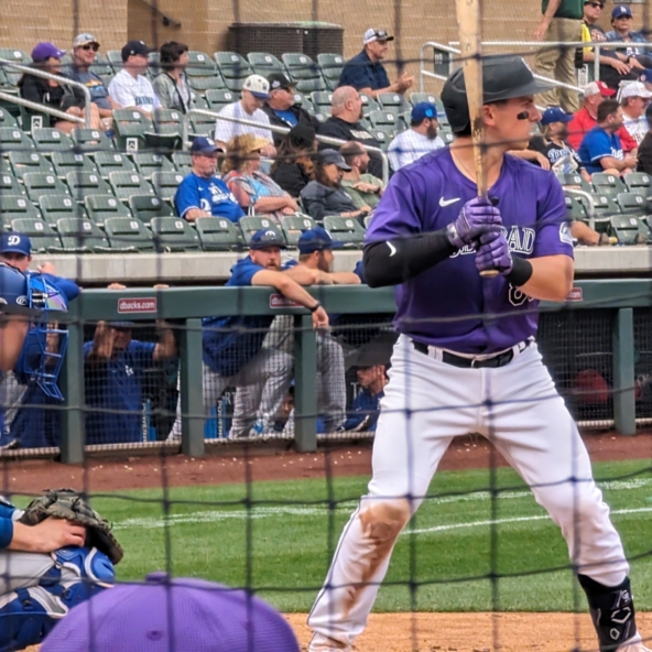 Jordan Beck of the Rockies batting against the Dodgers in a Cactus League game.
