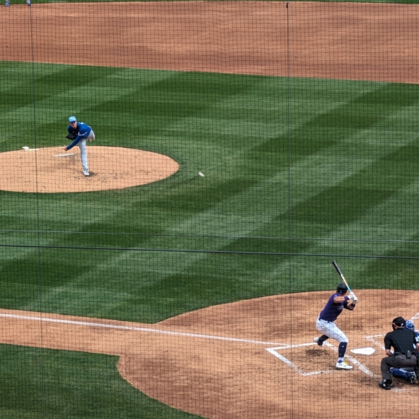 Cole Ragans of the Royals pitching to Ezequiel Tovar of the Rockies